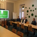 Podpisanie umów: Property Master i Spirit Games Studio w sali konferencyjnej.