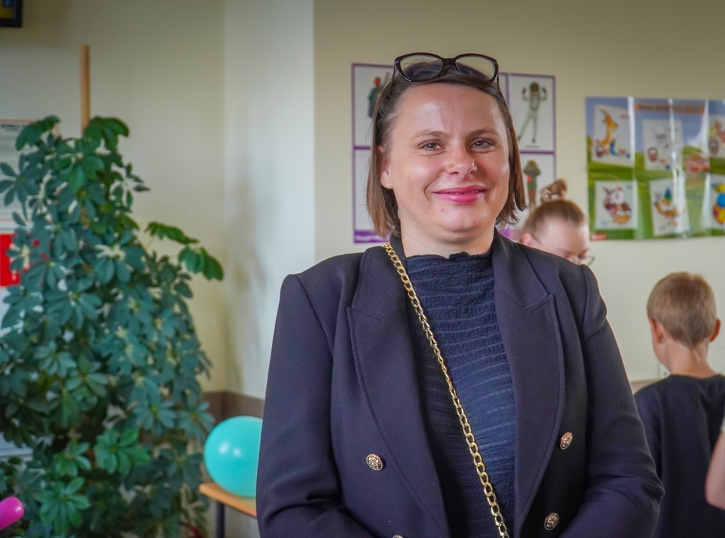 Uśmiechnięta kobieta na Festiwalu Kreatywności PANS Jarosław