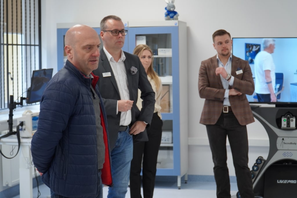 Uczestnicy konferencji naukowej o aktywności fizycznej i sprawności funkcjonalnej.