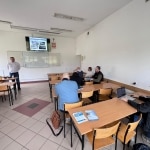 Spotkanie z przedstawicielem MDM Polska: prezentacja w sali szkoleniowej.