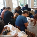 Warsztaty "Mam pomysł na biznes, ale co z moim klientem?" - uczestnicy w sali lekcyjnej